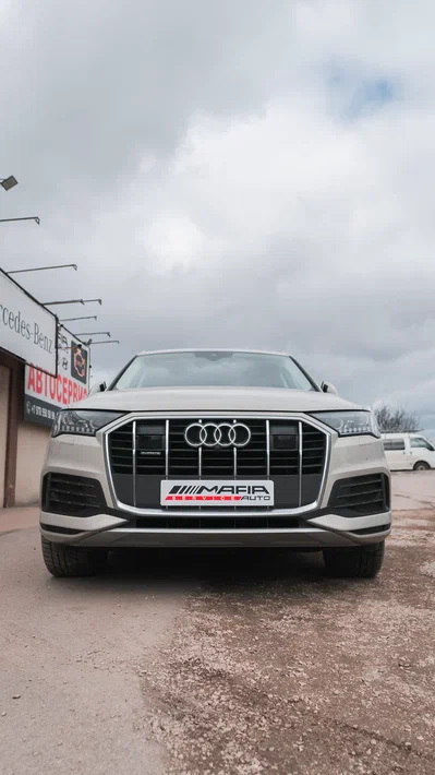 Замена тормозных колодок в круг автомобиля Ауди Q7