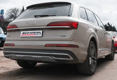 Замена тормозных колодок в круг автомобиля Ауди Q7